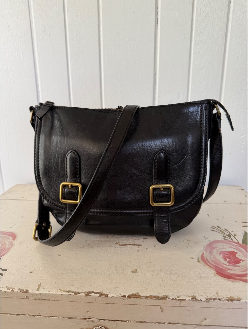 Frye Black Leather Crossbody Bag with Gold Buckle Accents and Adjustable Strap